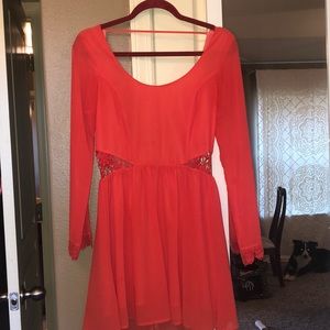 Red open back dress